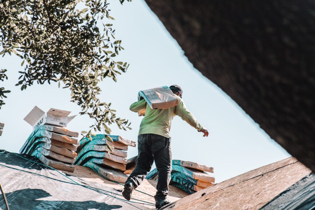 A contractor installing a new roof at a customer home in Orlando, Florida